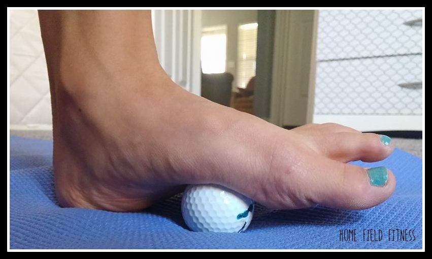 Golf balls for mini foot massages - the $20 at home rehab gym!